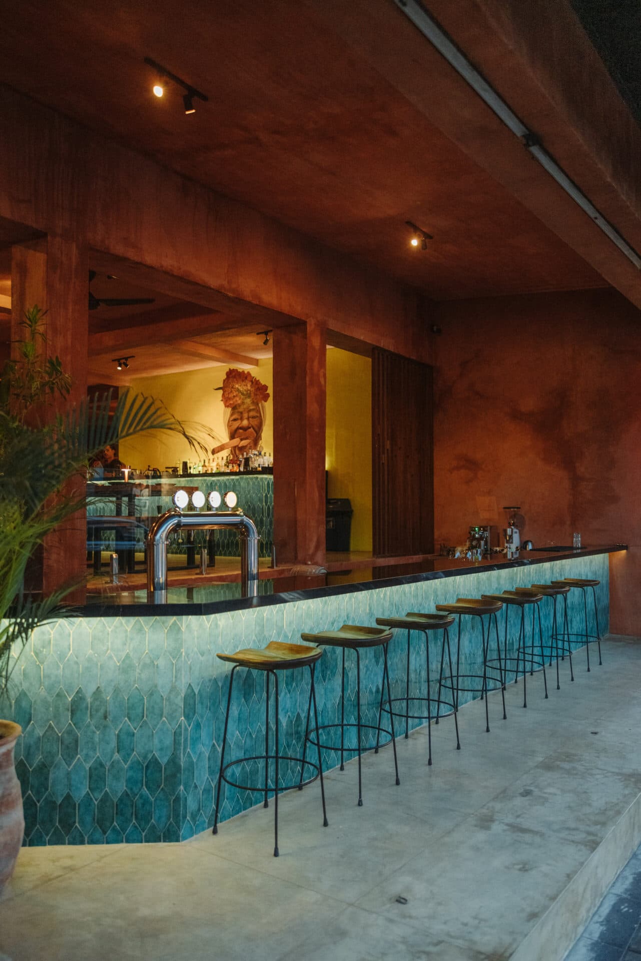 The bar, in terracotta and teal